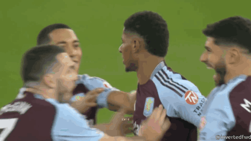A Group Of Soccer Players With One Wearing A Shirt With The Number 7 On It GIF