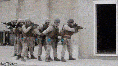 A Group Of Soldiers Are Standing In Front Of A Building With A Watermark That Says Imgflip.com On It GIF
