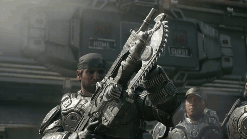 A Group Of Soldiers Are Standing In Front Of A Sign That Says " Home " GIF