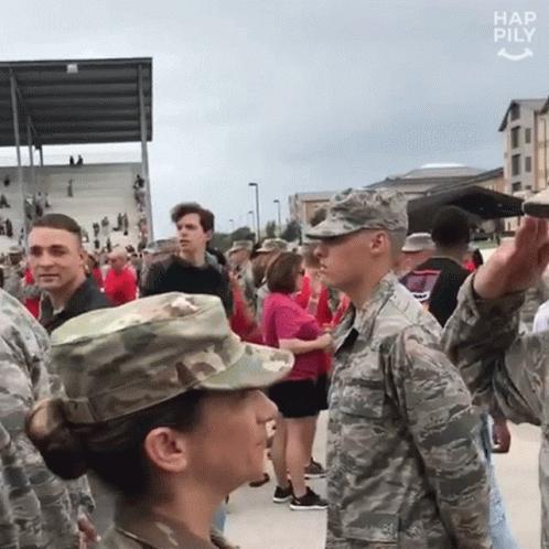Soldiers Standing Next To Crowd GIF