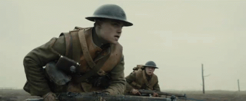 Soldiers Walking Through Field GIF