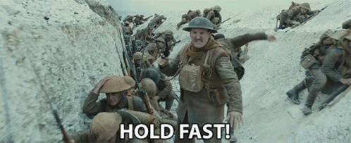 A Group Of Soldiers In A Trench With The Words Hold Fast Written On The Bottom GIF