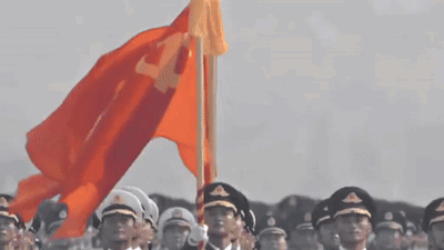 A Group Of Soldiers Marching In A Line With The Letter T On Their Uniform GIF