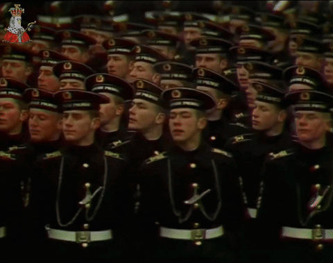 A Group Of Soldiers Wearing Black Uniforms And Hats With The Letters O On Them GIF