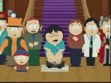 A Group Of South Park Characters Are Standing Around A Man Kneeling Down GIF