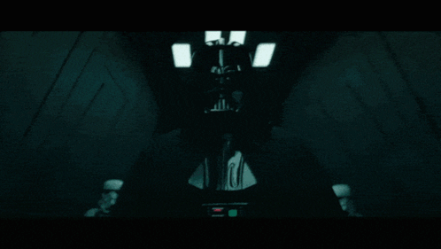 A Group Of Stormtroopers Are Standing In A Room GIF