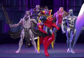 a group of superhero figures standing next to each other on a stage