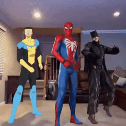 A Group Of Superheroes Are Dancing In A Living Room GIF