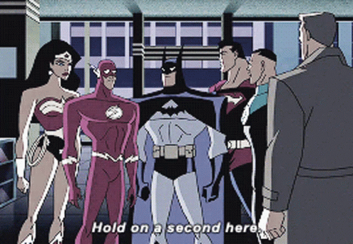 A Group Of Superheros Are Standing Next To Each Other With The Words Hold On A Second Here GIF