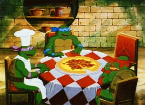 A Group Of Teenage Mutant Ninja Turtles Are Sitting Around A Table Eating Pizza GIF