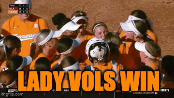 A Group Of Tennessee Softball Players Huddle Together With The Words Lady Vols Win Above Them GIF
