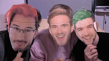 A Group Of Three Men Are Posing For A Picture With Their Faces On A Stick . GIF