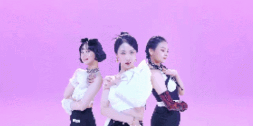 A Group Of Three Women Standing Next To Each Other On A Purple Background GIF
