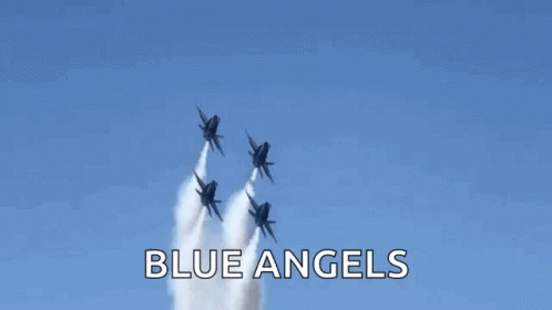 A Group Of Us Navy Fighter Jets Fly In Formation GIF
