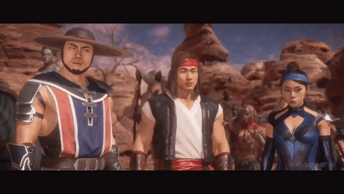 A Group Of Video Game Characters Are Standing Next To Each Other In A Desert . GIF