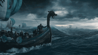 A Group Of Vikings Are Riding On The Back Of A Ship In The Ocean GIF