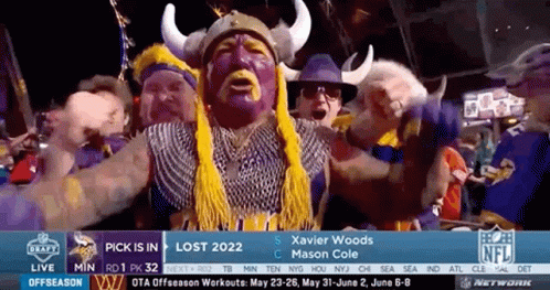 A Group Of Vikings Fans Are Watching A Game GIF