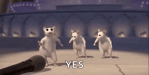 A Group Of White Mice Are Dancing In Front Of A Microphone And Saying Yes . GIF