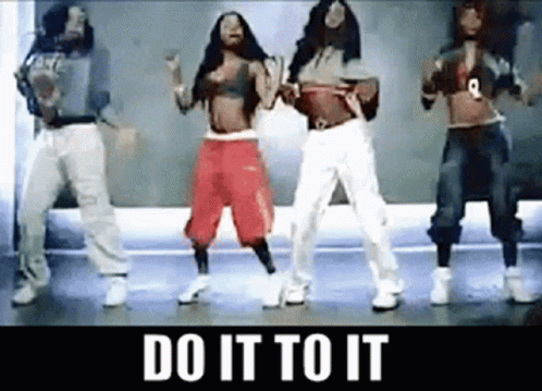 A Group Of Women Are Dancing In Front Of A Sign That Says " Do It To It " . GIF