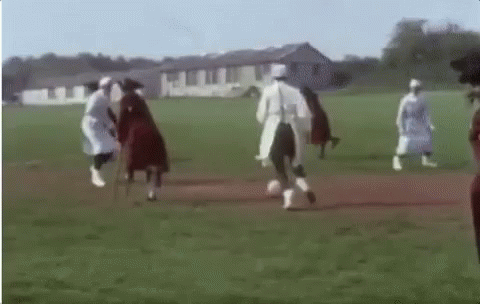 A Group Of Women Are Playing Soccer On A Field . GIF