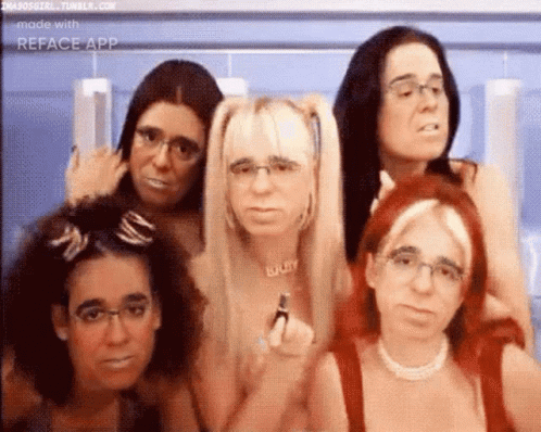 A Group Of Women Are Posing For A Picture And One Of Them Has The Name Lilly On Her Neck GIF