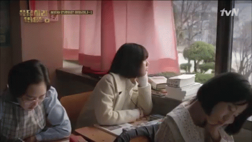 A Group Of Women Are Sitting In A Classroom With A Tvn Logo On The Bottom Right GIF