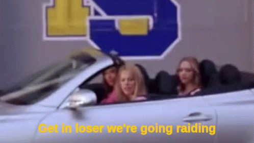 A Group Of Women Are Sitting In A Convertible Car . GIF