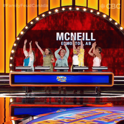A Group Of Women Are Standing In Front Of A Sign That Says Mcneill On It GIF