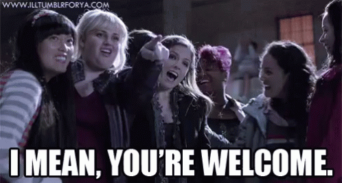 A Group Of Women Are Standing Next To Each Other And One Of Them Is Saying I Mean You 'Re Welcome . GIF