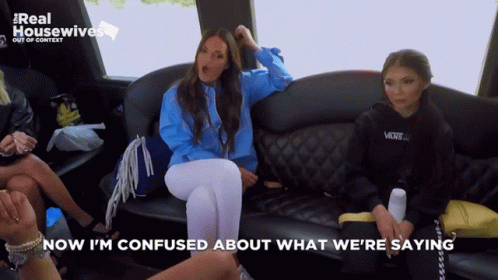 A Group Of Women Sitting On A Couch With The Words Now I 'M Confused About What We 'Re Saying Below Them GIF