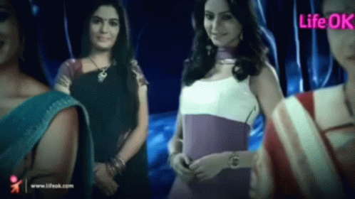 A Group Of Women Standing Next To Each Other With The Word Life Ok On The Bottom Right GIF