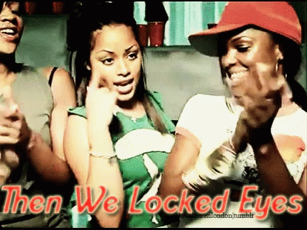 A Group Of Women Standing Next To Each Other With The Words Then We Locked Eyes Above Them GIF