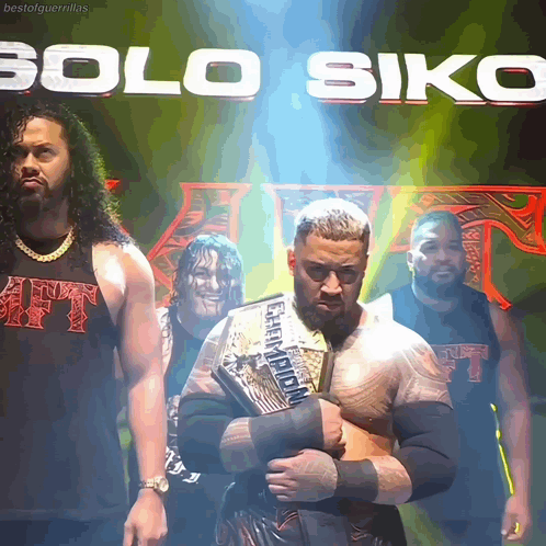 A Group Of Wrestlers Are Standing In Front Of A Banner That Says Solo Siko GIF