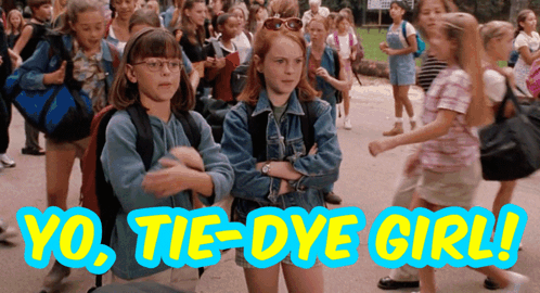 A Group Of Young Girls Are Walking Down A Street With The Words Yo Tie-Dye Girl Written On The Bottom GIF