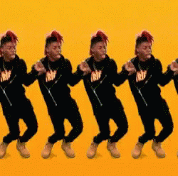 A Group Of Young Men Are Dancing In A Row Wearing Black Shirts That Say Trw On Them GIF