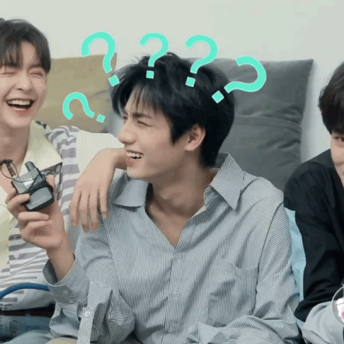 A Group Of Young Men Are Laughing With Question Marks Around Their Heads GIF