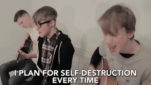 A Group Of Young Men Are Singing And Playing Guitars While Sitting On A Couch . GIF