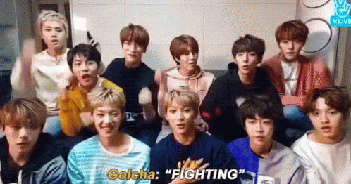 A Group Of Young Men Are Sitting On A Couch And One Of Them Is Talking About Fighting . GIF