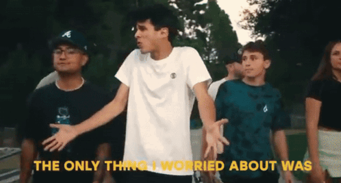 A Group Of Young Men Are Standing In A Line With The Words " The Only Thing I Worried About Was " Written Above Them GIF