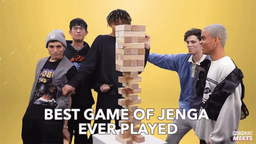 A Group Of Young Men Playing Jenga With The Words Best Game Of Jenga Ever Played Above Them GIF