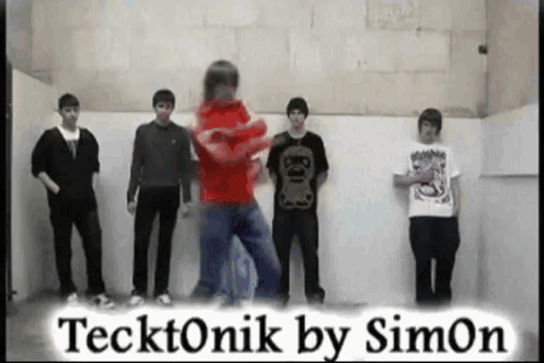 A Group Of Young Men Standing In Front Of A Wall With The Words Tecktonik By Simon GIF