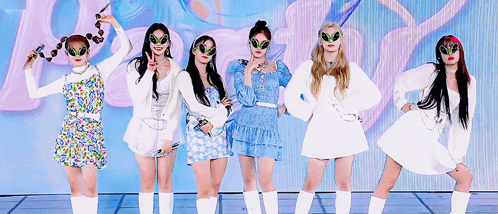 A Group Of Young Women Wearing Alien Glasses Are Standing Next To Each Other . GIF