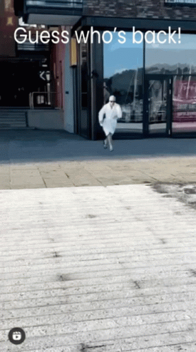 A Guess Who 'S Back Advertisement With A Man In A Bathrobe GIF