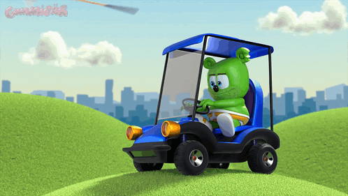 A Gummy Bear Is Driving A Blue Golf Cart On A Hill GIF