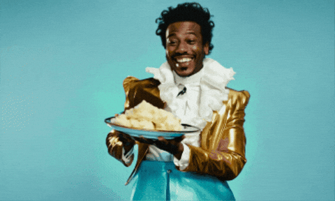 A Guy Dancing The Potato On The Plate GIF