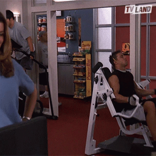 A Gym With A Sign That Says Tv Land GIF