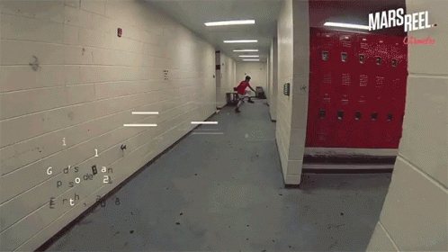 A Hallway With Red Lockers And The Words Mars Reel On The Bottom GIF