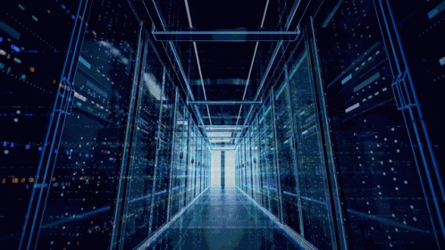 A Hallway With Rows Of Servers And A Light At The End Of It GIF
