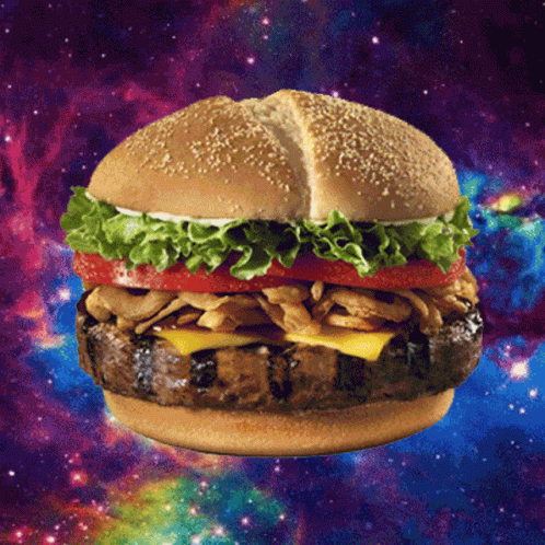 a hamburger with lettuce tomato mushrooms and cheese is floating in space