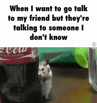 A Hamster Standing Next To A Coca Cola Bottle GIF